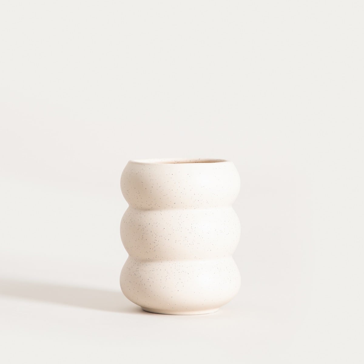 BUBBLY Handleless Ceramic Mug Cream Spotted 0.3L